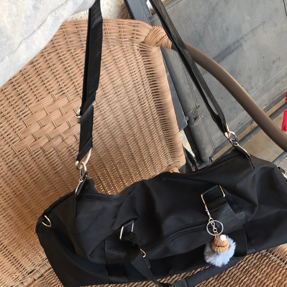 Black Women's Travel Duffel Bag with Pom Keychain - Picture 7 of 8